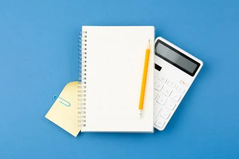 Notepad, pencil, calculator note sheet Office desk Stock Photos