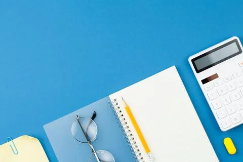 Notepad, pencil, calculator, note sheet, glasses. Stock Photos