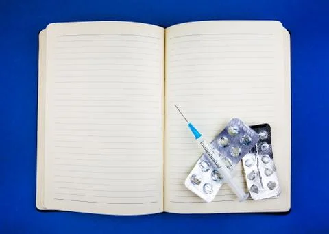 Notepad with a Pills Stock Photos
