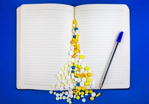 Notepad with a Pills Stock Photos