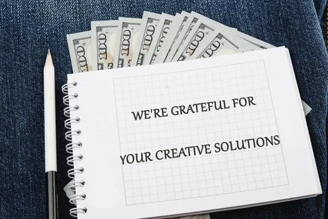 A notepad placed on a denim surface features the message expressing gratitu.. Stock Photos