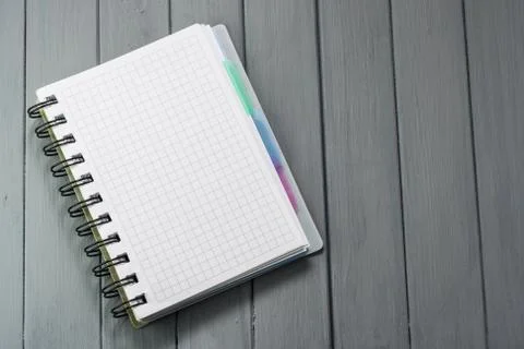 Notepad for recording on a wooden table. Stock Photos