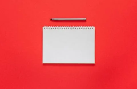 Notepad on on a red background Stock Photos