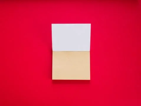 Notepad on red copy space top view Stock Photos