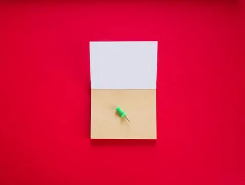 Notepad on red copy space top view Stock Photos