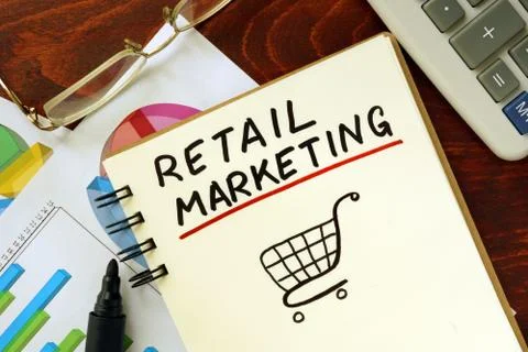 Notepad with retail marketing on the table. Stock Photos
