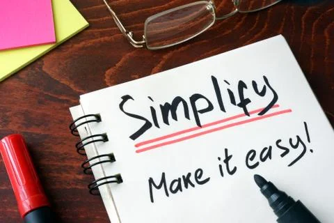 Notepad with sign simplify.  Make it easy. Stock Photos