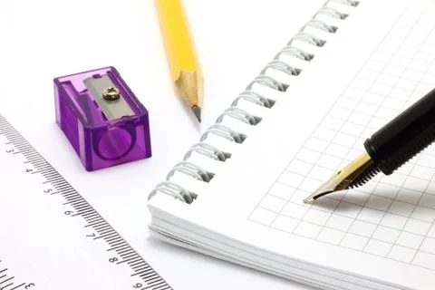 Notepad with stationary objects Stock Photos