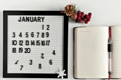 Notepad for taking notes of goals and plans for the new year, calendar and Ch Stock Photos