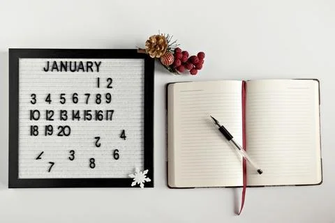 Notepad for taking notes of goals and plans for the new year, calendar and Ch Stock Photos