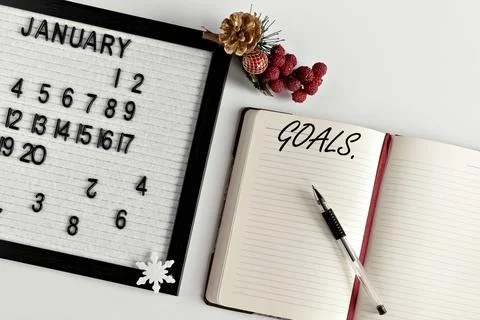 Notepad for taking notes of goals and plans for the new year, calendar and Ch Stock Photos