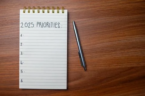 Notepad with text 2025 Priorities. Stock Photos