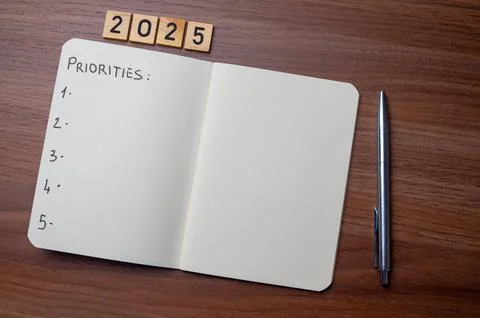 Notepad with text 2025 Priorities. Stock Photos