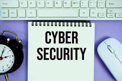 Notepad with the text "Cyber Security" with white keyboard, wireless mouse .. 写真素材