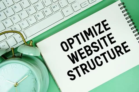 Notepad with the text "Optimize Website Structure" and white keyboard and a.. Stock Photos