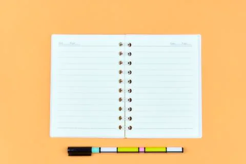 Notepad for text on a pastel color table with a copy. The concept of educatio Stock Photos