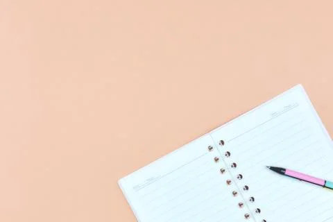 Notepad for text on a pastel color table with a copy. The concept of educatio Stock Photos