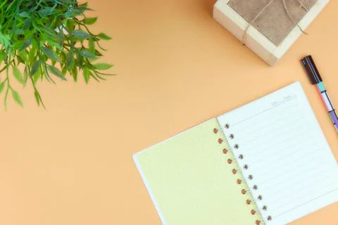 Notepad for text on a pastel color table with a copy. The concept of educatio Stock Photos