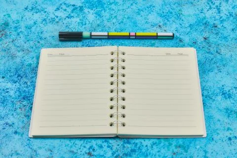 Notepad for text on a pastel color table with a copy. The concept of educatio Stock Photos