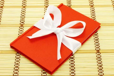 Notepad with white bow Foto stock