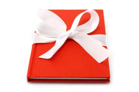 Notepad with white bow Stock Photos