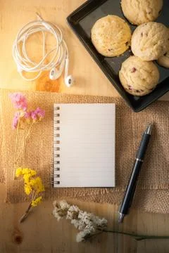 Notepad on wood table Stock Photos