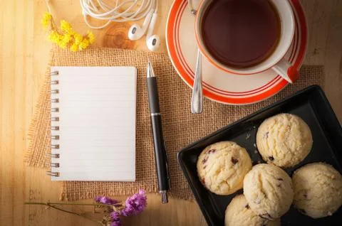 Notepad on wood table Stock Photos