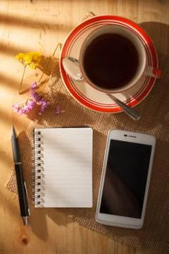 Notepad on wood table Stock Photos