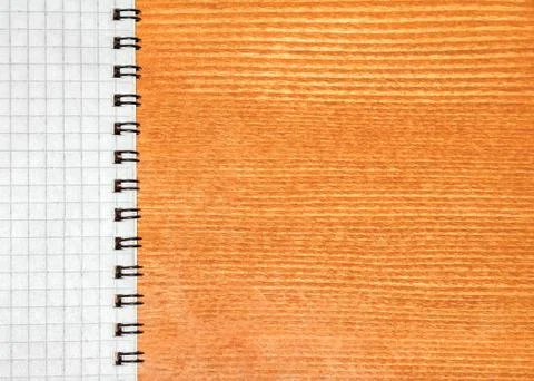 Notepad on a wooden background Stock Photos