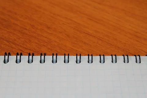 Notepad on a wooden table with copy space. View from above. Design blank Foto stock