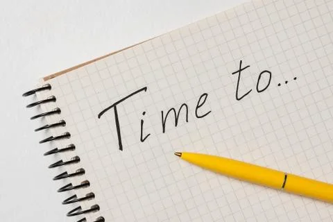 Notepad with the words Time to on white background. Handwritten. Clouse up 스톡 사진