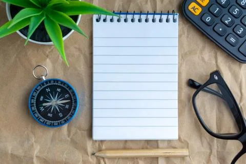 Notepad,flower vase,spectacle,pencil ,compass,globe, calculator Fotos Stock