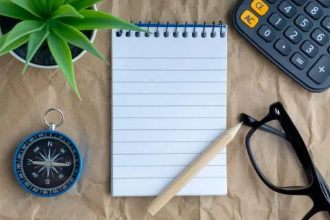 Notepad,flower vase,spectacle,pencil ,compass,globe, calculator 写真素材