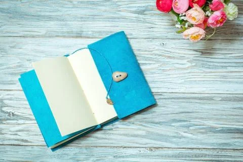 Notes and flowers Stock Photos