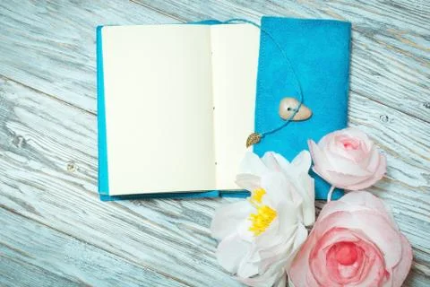 Notes and flowers Stock Photos