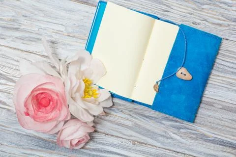 Notes and flowers Stock Photos