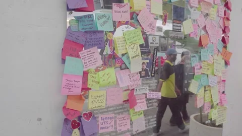Notes and prayers on memo pads posted in public places. in front of the mirror Stock Footage 221800497