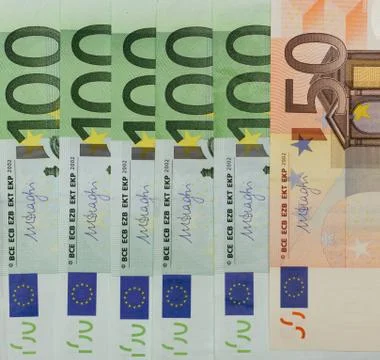 Notes background of 100 and 50 euros. European, paper bills. Stock Photos