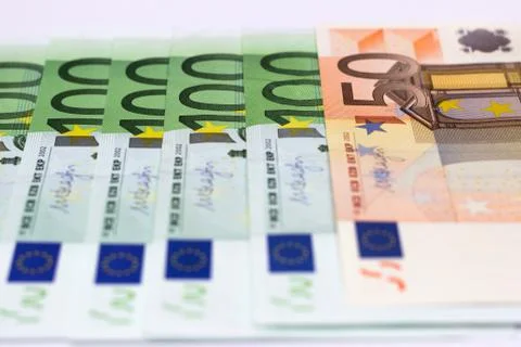 Notes background of 100 and 50 euros. European, paper bills. Stock Photos