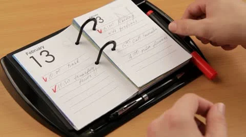 Notes in the notepad on the Valentine's date.  HD Video stock 10574246