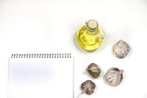 Notes to save the recipes on a white kitchen table. Seasonings, culinary ingr Stock Photos