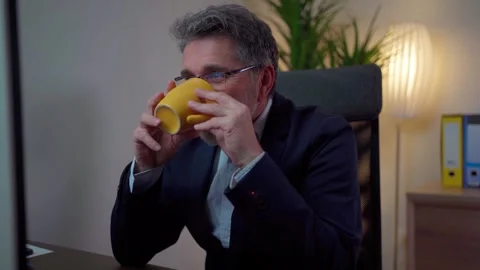 Nothing better than the first cup of coffee at work. Stock Footage 268328262