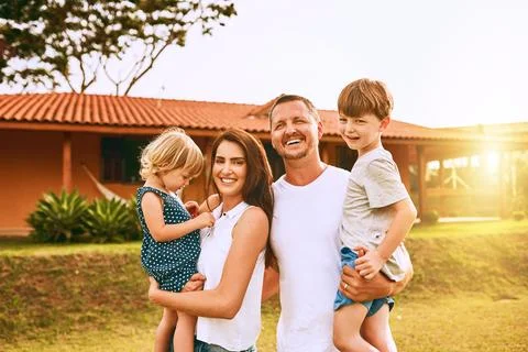 Nothing can replace these moments. Cropped shot of a young family spending time Stock Photos