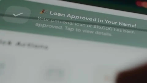Notification from the banking app stating Loan Approved in Your Name Stock Footage 333823689