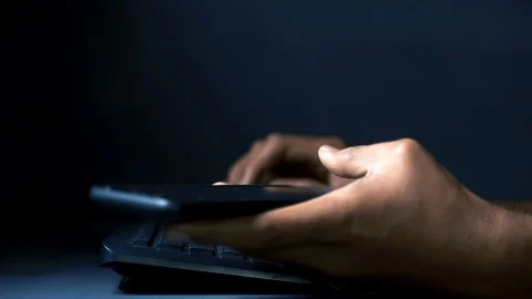 Notification distraction from mobile while at work Stock Footage 121871596