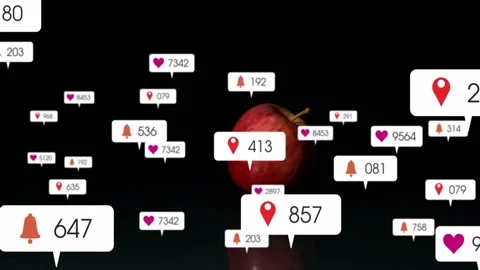 Notification icon appearing near red apple anchoring icons entering floating Stock Footage 323269292