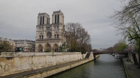 Notre Dam Cathedral by the River Stock Footage