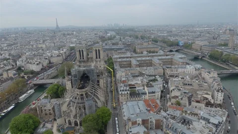Notre-Dame Cathedral with Eiffel Tower in the background after the fire Stock Footage 114714575