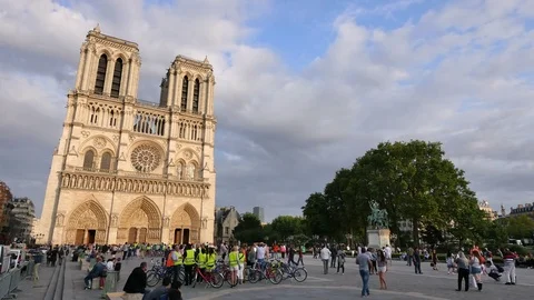 Notre Dame Cathedral Paris Crowded at Sunset Stock Footage 79244528