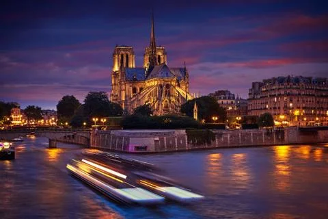 Notre Dame cathedral Paris sunset at Seine 写真素材